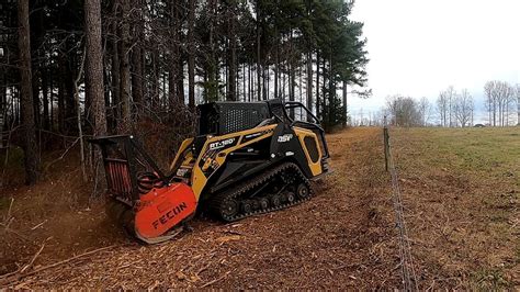 clearing fence row with skid steer|fence row removal tools.